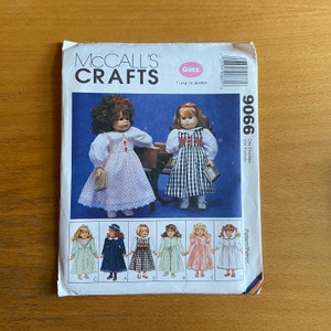 May include: McCall's Crafts pattern 9066 for making doll clothes. The pattern includes instructions for making six different outfits for a Gotz doll. The outfits include a polka dot dress, a gingham dress, a blue dress, a plaid dress, a green dress, and a pink dress.