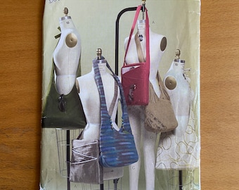 Vogue VP689/689/8274Travel Tote sewing pattern. Fashion accessories Crossbody Purse Bag. Lined/zipper pockets Shoulder UNCUT