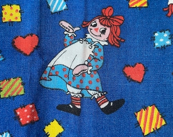 Sold by Half-yard x 44" wide quilt cotton. Raggedy Ann and Andy c.1978 Springs Industries 3" motifs on blue background Bobbs-Merrill co Inc