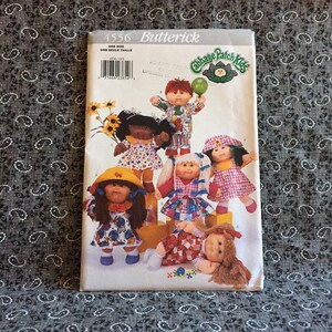 Butterick 4556 Cabbage Patch Kids clothes Uncut sewing pattern dress and pinafore 6 outfits for 14" cabbage patch dolls