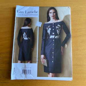 Peut inclure: Un patron de couture pour une robe à col bateau et manches longues. Le patron est pour les tailles 14-16-18-20-22. La robe est présentée dans un tissu denim bleu foncé avec des broderies blanches. Le patron est de Vogue Patterns et est conçu par Guy Laroche.