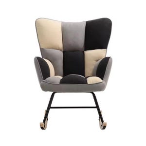 May include: A patchwork rocking chair with grey, black and beige fabric upholstery. The chair has a black metal frame and wooden rockers.