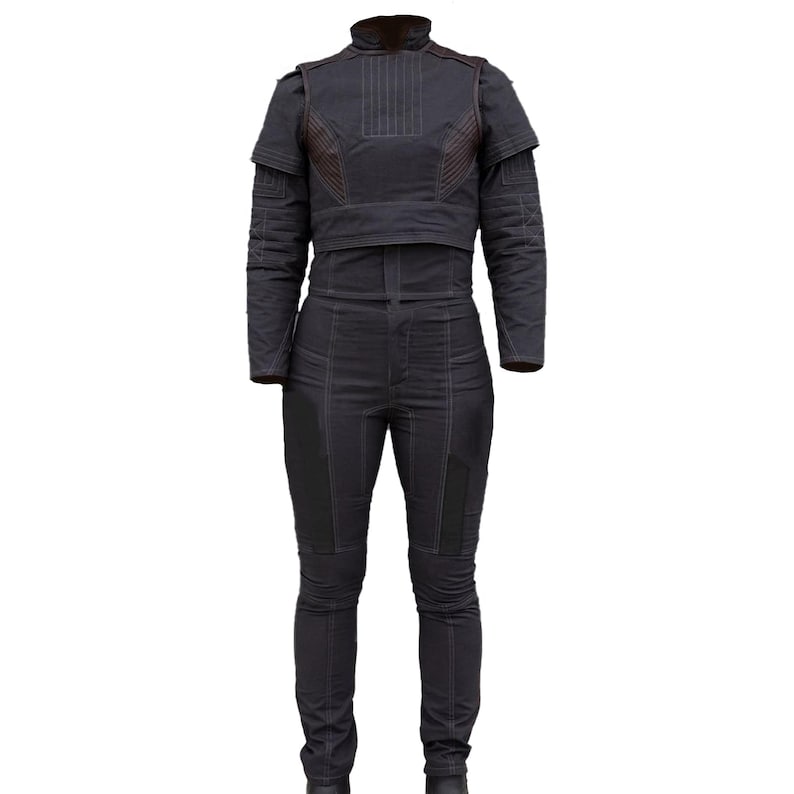 May include: A dark gray jumpsuit with a high collar and long sleeves. The top has a cropped design with brown accents on the shoulders and chest. The pants are fitted with visible stitching details. This outfit is suitable for cosplay or costume events.