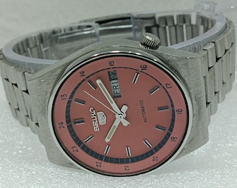 Vintage Seiko 5 Automatikuhr, oranges Zifferblatt, Day Date, Made in Japan