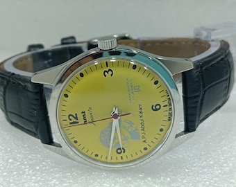 Vintage HMT Janata Mechanical Watch: Yellow Dial, Para Shock, 17 Jewels
