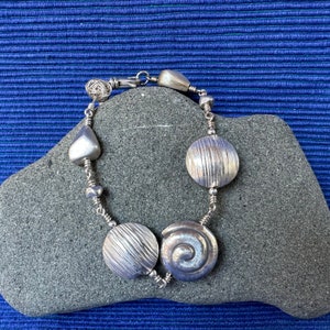 Silver Bracelet with Swirls, Discs and Nuggets image 7