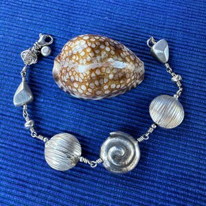 Silver Bracelet with Swirls, Discs and Nuggets image 9