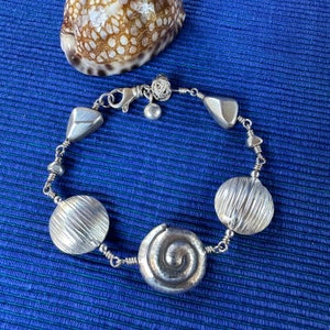 Silver Bracelet with Swirls, Discs and Nuggets image 6