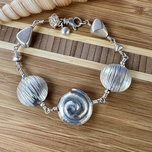 Silver Bracelet with Swirls, Discs and Nuggets image 8