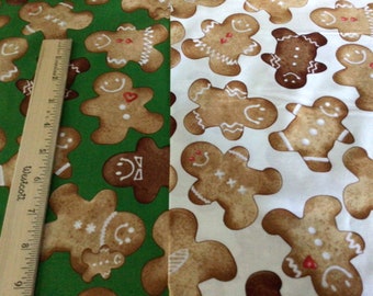 May include: A close-up of two fabric swatches with a gingerbread man pattern. The fabric on the left is green with white gingerbread men. The fabric on the right is white with brown gingerbread men.