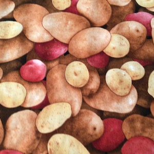 May include: A fabric pattern featuring a close-up view of various potatoes. The design includes brown, red, and yellow potatoes of different shapes and sizes, creating a textured and colorful pattern.
