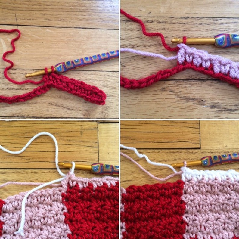 May include: A close-up of a crochet project in progress. The project is made with red, pink, and white yarn. The crochet hook is visible in the image.