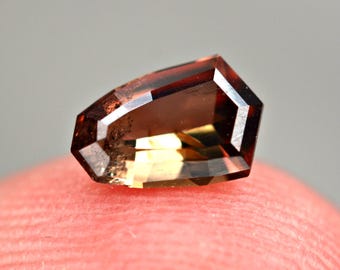 0 520ct Multicolor Axinite Gemstone: Cushion Cut from Pakistan