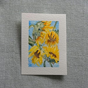 Tournesols peints à la main à l'aquarelle sur carton pour carte ou cadre. Tournesols peints à la main à l'aquarelle sur carte ou cadre.