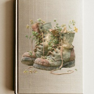 May include: A hardcover book with a textured beige cover featuring a central illustration of a pair of weathered, sage green lace-up boots. Small yellow and white wildflowers and green foliage grow out from the interior of the boots.