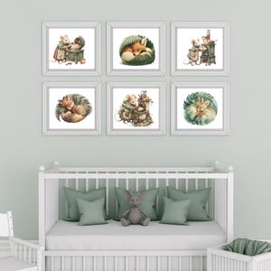 May include: A set of six framed wall art prints featuring watercolor-style illustrations of anthropomorphic mice baking and foxes sleeping curled up in green foliage, arranged in two rows of three above a white wooden crib with green pillows.