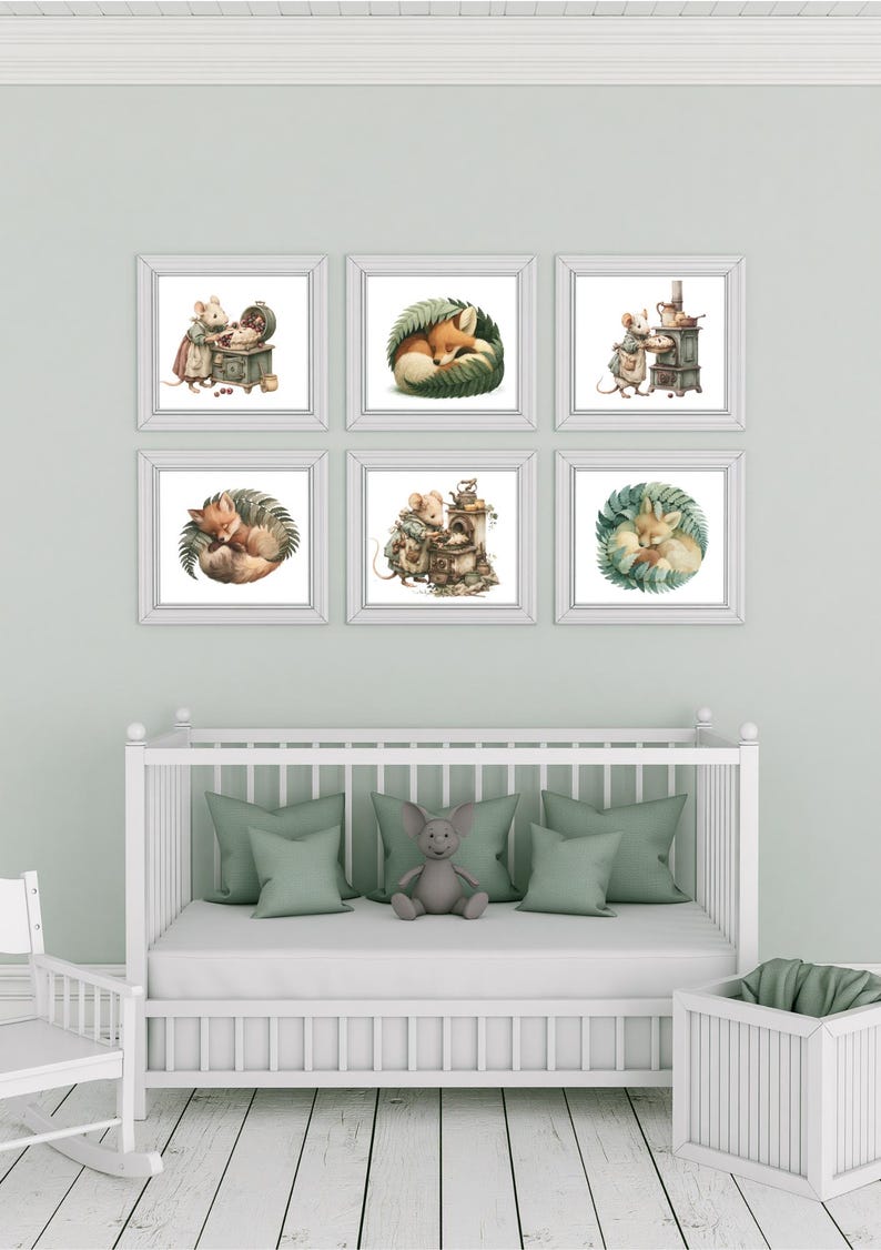 May include: A set of six framed wall art prints featuring watercolor-style illustrations of anthropomorphic mice baking and foxes sleeping curled up in green foliage, arranged in two rows of three above a white wooden crib with green pillows.