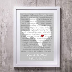 May include: Framed print with a light gray background featuring a passage about love, a red heart, and the names "Frank & Mel" with the date "Feb. 15 2017". The print is in a white frame.