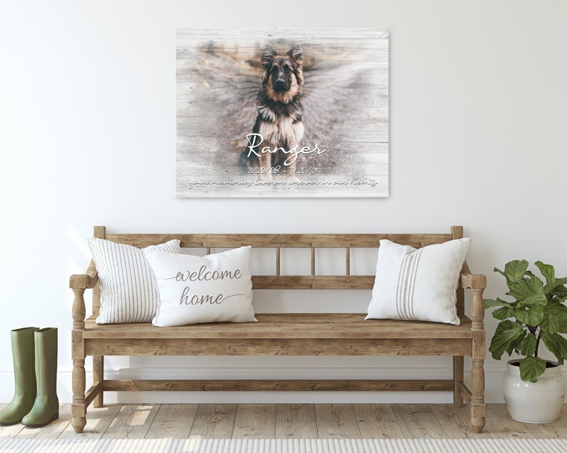 May include: A memorial canvas print featuring a German Shepherd dog with a white background and the text "Ranger 2/12/18 - 4/21/21" and "your paw prints forever in our hearts".