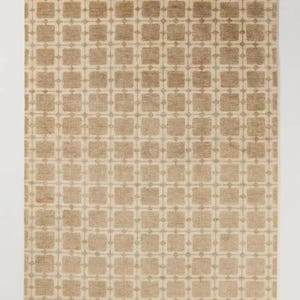 May include: A rectangular rug with a repeating pattern of squares and small connecting dots. The rug has a neutral color palette of beige and light brown, creating a subtle, textured design. The rug is suitable for a living room or bedroom.