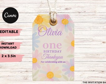 May include: A pastel-colored tag with a floral design, featuring the name "Olivia" and the text "one birthday Thank you". The tag is 2 x 3.5 inches and has a string for hanging. The design includes watercolor daisies in shades of yellow, pink, and blue.