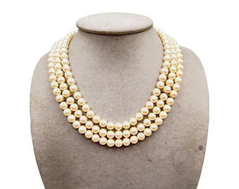Vintage Triple Strand Of Faux Pearls Necklace With Golden Seashell Clasp