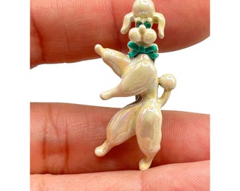 Vintage Poodle Brooch With Wiggly Head & Green Bow Iridescent White Enamel
