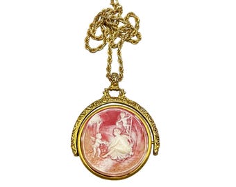 Vintage Spinning Cameo Necklace Unsigned Gold Tone Resin Cameo With Twisted Rope Chain