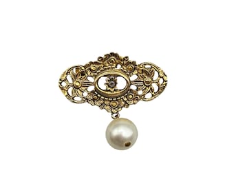 Vintage Gold Tone Floral Filigree Brooch with Faux Pearl Drop Openwork Design