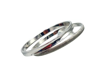 Vintage Bangles Bracelets Silver Tone Textured And Shiny MONET Signed Set Of 2