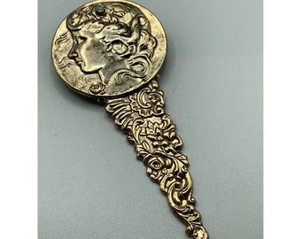 Repousse Art Nouveau Inspired Brooch Face & Rhinestone Gold Tone Metal Stamping