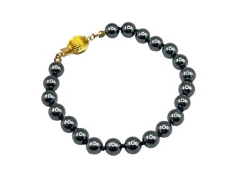 Hematite Glass Beaded Bracelet with Gold Tone Clasp Hand Knotted Beads