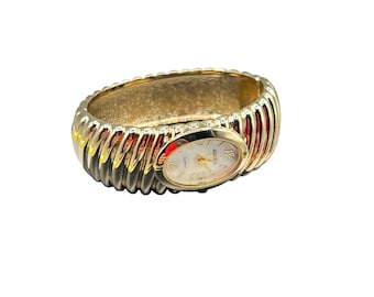 Agenda Wrist Watch Clamper Bracelet Gold Tone Ribbed Band Oval Shaped
