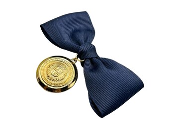 Liz Claiborne Blue Bow Pin Ribbon Brooch with Gold Tone Medallion Dangle Pendant