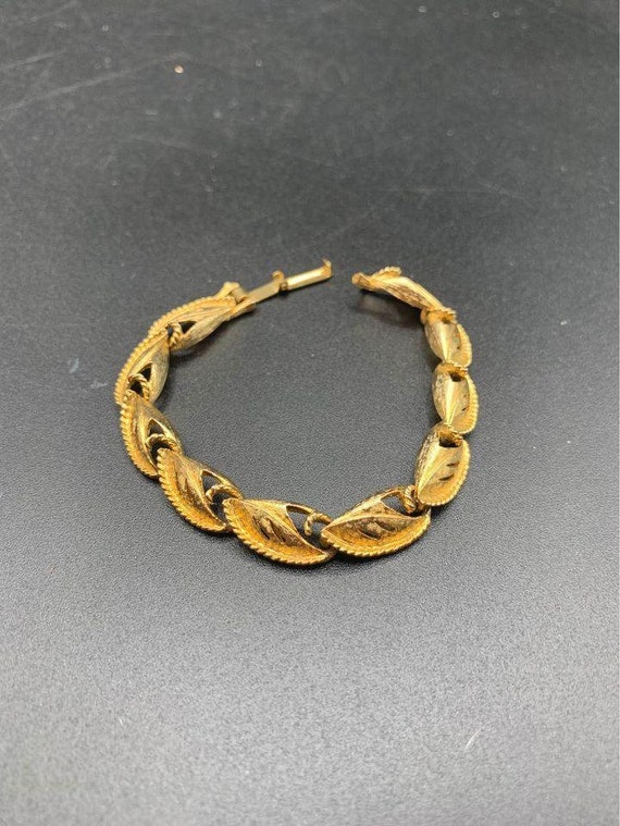Textured gold tone leaves design bracelet brushed 