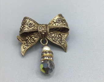 Bow Pin Brooch Ornate Puffy Antiqued Gold Tone with AB Aurora Borealis Dangle