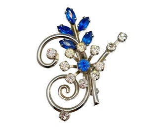 Silver Tone Mid Century Pin brooch Clear And Blue Rhinestones Swirls And Flower