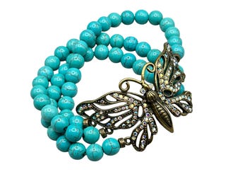 KIRKS FOLLY Beaded Crystals Butterfly Bracelet Turquoise Color Beads Elastic Stretch