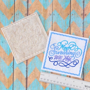 May include: Two embroidered patches with the text "Maybe Swearing Will Help" in a cursive font. The patch on the left is beige with white embroidery. The patch on the right is white with blue, purple, and white embroidery.