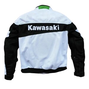 May include: A white and black motorcycle jacket with a green Kawasaki logo on the back.