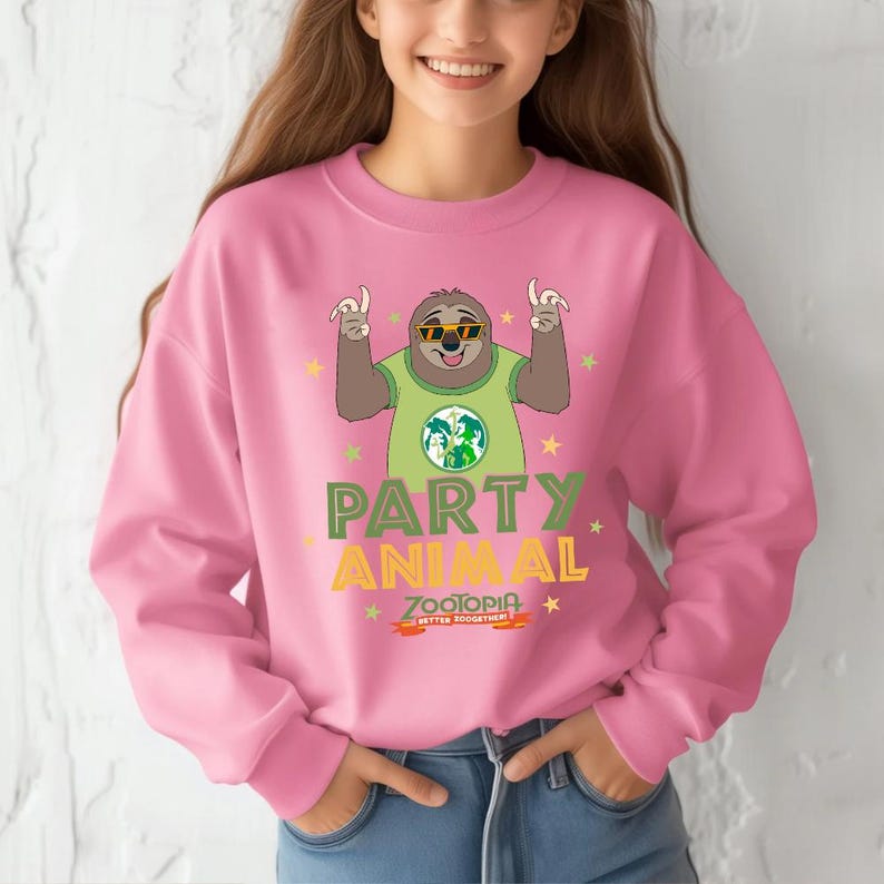 A woman wearing a pink sweatshirt with a cartoon sloth and the text "Party Animal" printed on it.