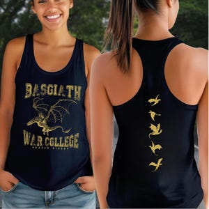A woman wearing a black tank top with a dragon design and text printed on it, smiling at the camera.