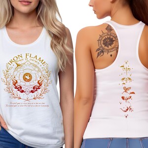 a woman wearing a white tank top with a graphic design on the front and a tattoo on her back.
