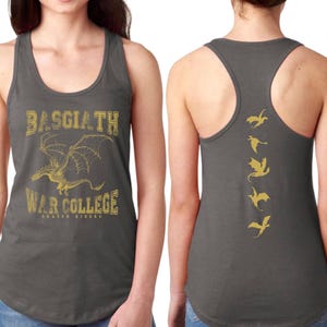 a woman wearing a grey tank top with a graphic design on the front and back.