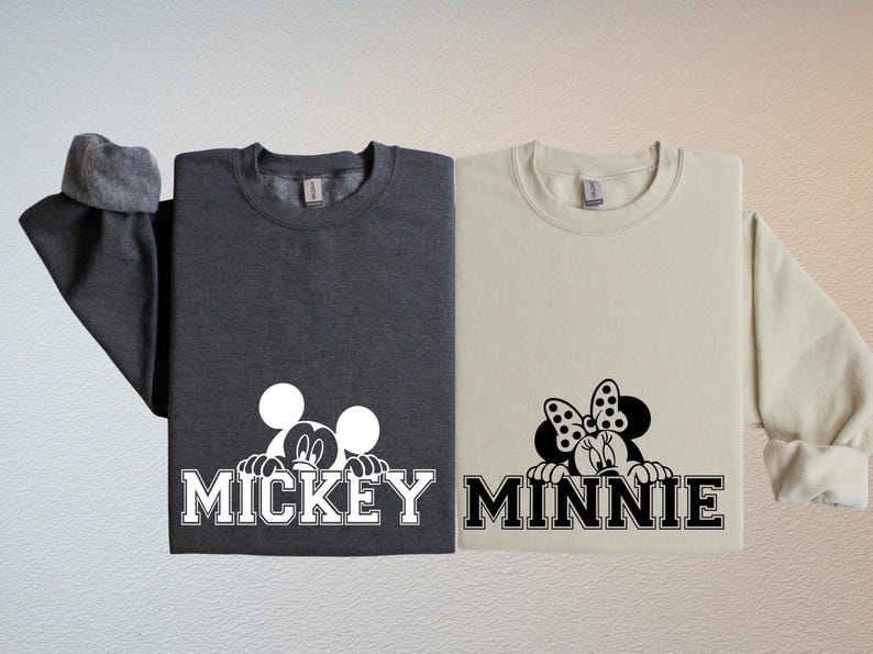 two t-shirts with the word "MICKEY" and the word "MINNIE" printed on them, along with the iconic Mickey Mouse and Minnie Mouse logos.