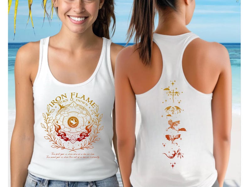 A woman wearing a white tank top with a design on the front and back, smiling at the camera.