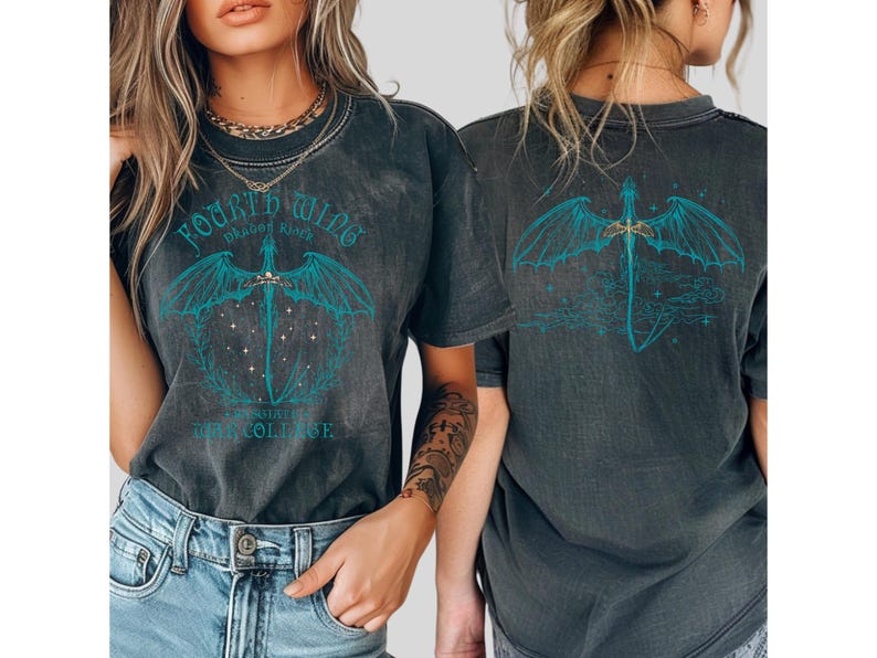 two women wearing black t-shirts with a dragon design on the back.