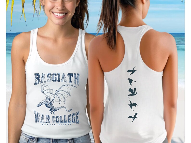 A woman wearing a white tank top with a graphic of a dragon and the text "BASGIATH WAR COLLEGE DRAGON RIDERS" printed on it, standing in front of a beach with palm trees and a blue sky.