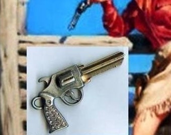 little six shooter gun key blank with swarovski crystals