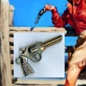 little six shooter gun key blank with swarovski crystals image 1